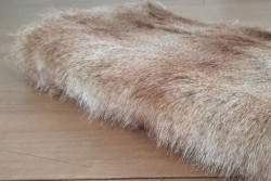 Layer fur bruin