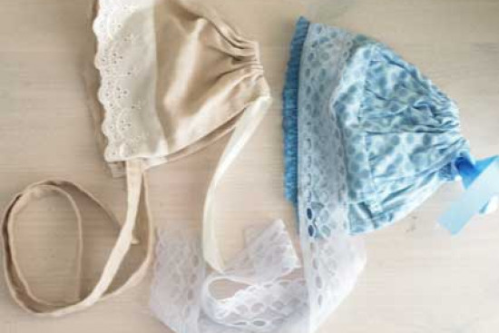 Bonnet, beige of blauw Bonnet, beige of blauw